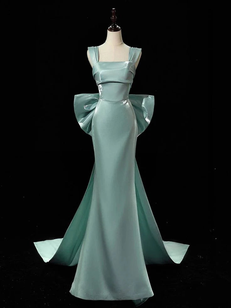 Elegant green satin long prom dress with a delicate bow tie detail.