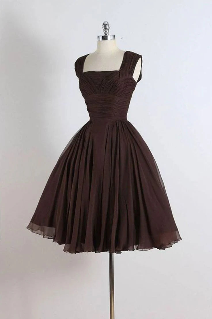 Model wearing a dark brown short chiffon A-line cocktail dress with V-neck.