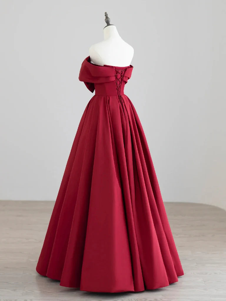 Back view of a dark red A-line satin long evening gown.
