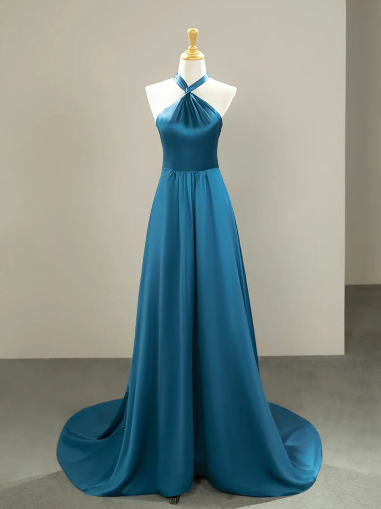 Woman wearing an elegant blue satin long prom dress with a V-neckline.