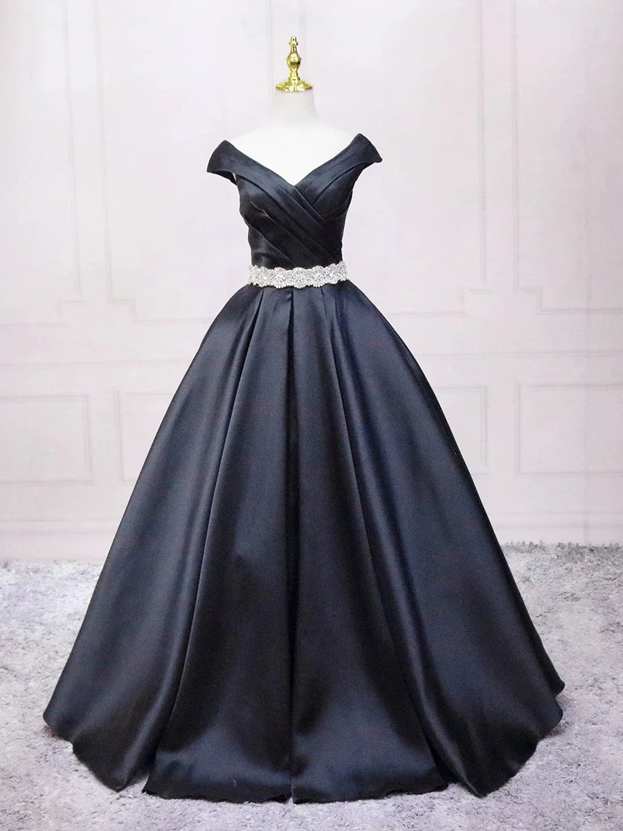 Woman wearing an elegant black A-line V-neck satin long prom dress.