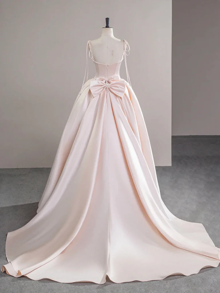 Side view of the champagne pink A-line satin long formal dress.