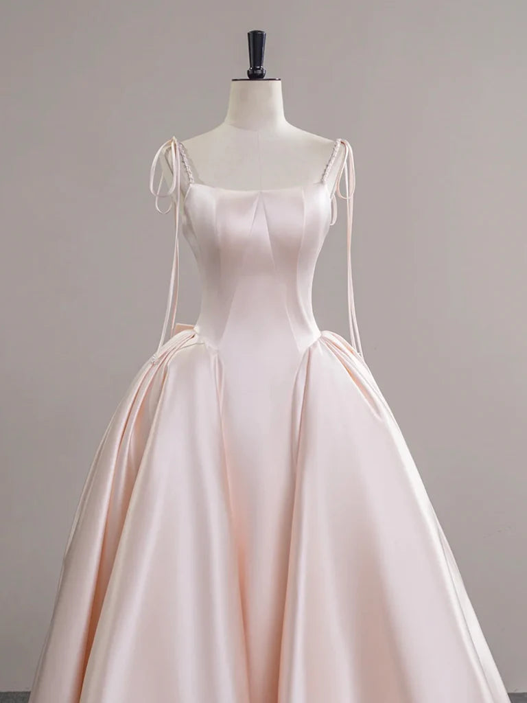 Back view of the elegant champagne pink satin prom gown.