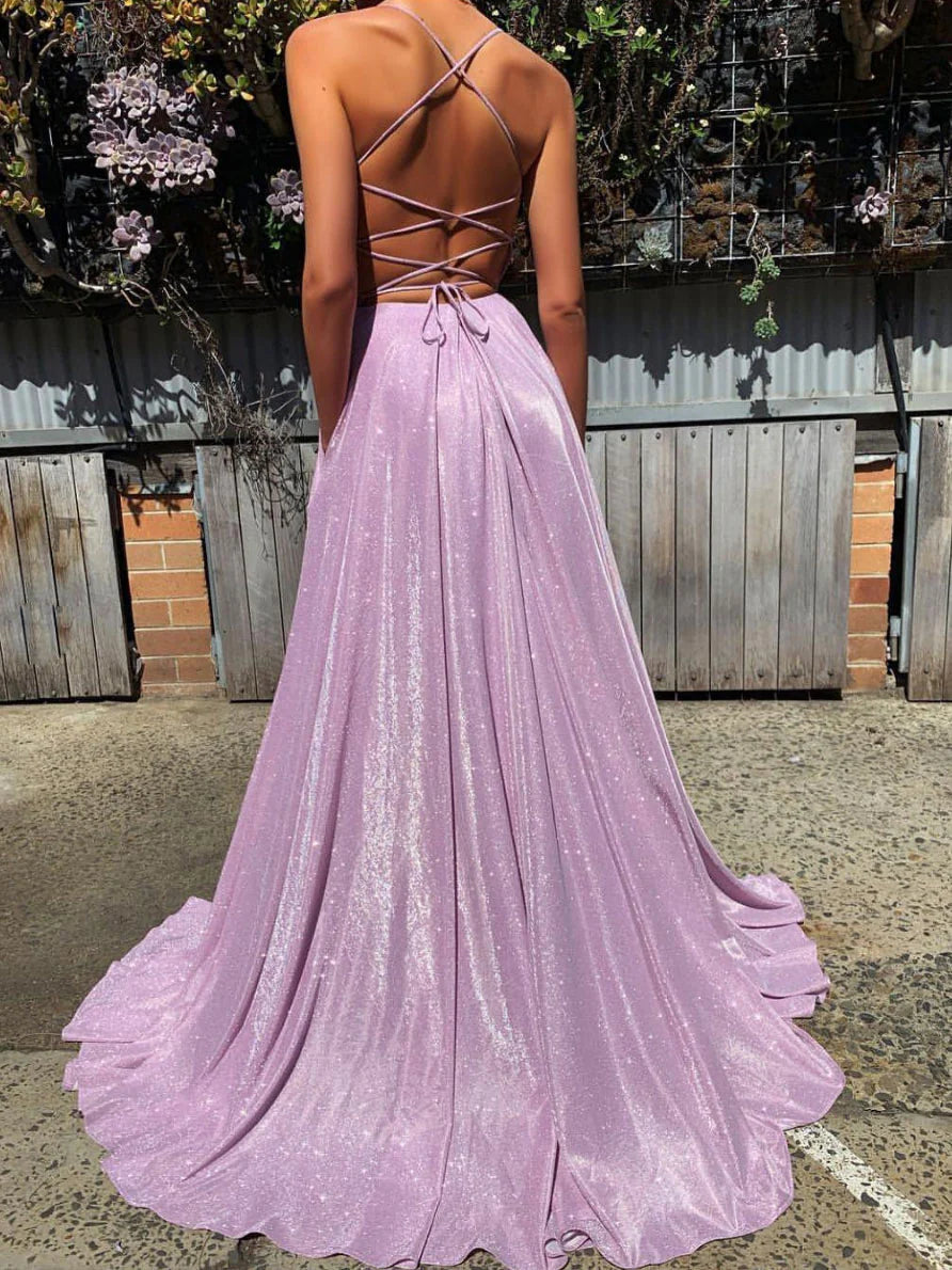 Woman in elegant purple V-neck satin long evening dress, side view.
