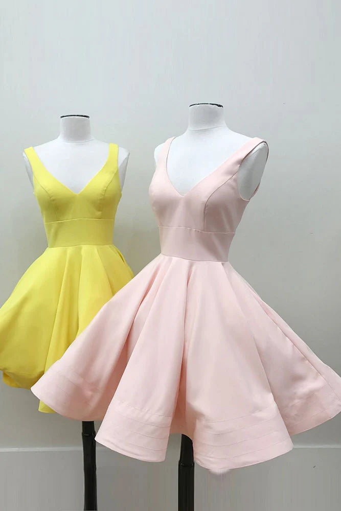 Woman wearing an elegant V-neck A-line short satin prom dress.