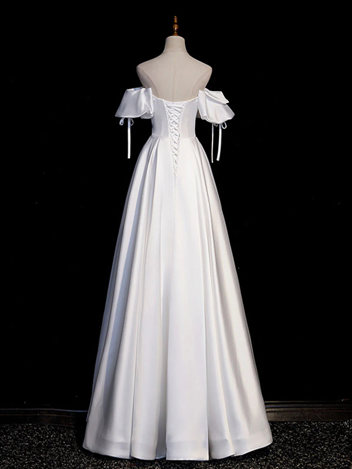 Back view of the white A-line satin long prom dress, showcasing its graceful drape.