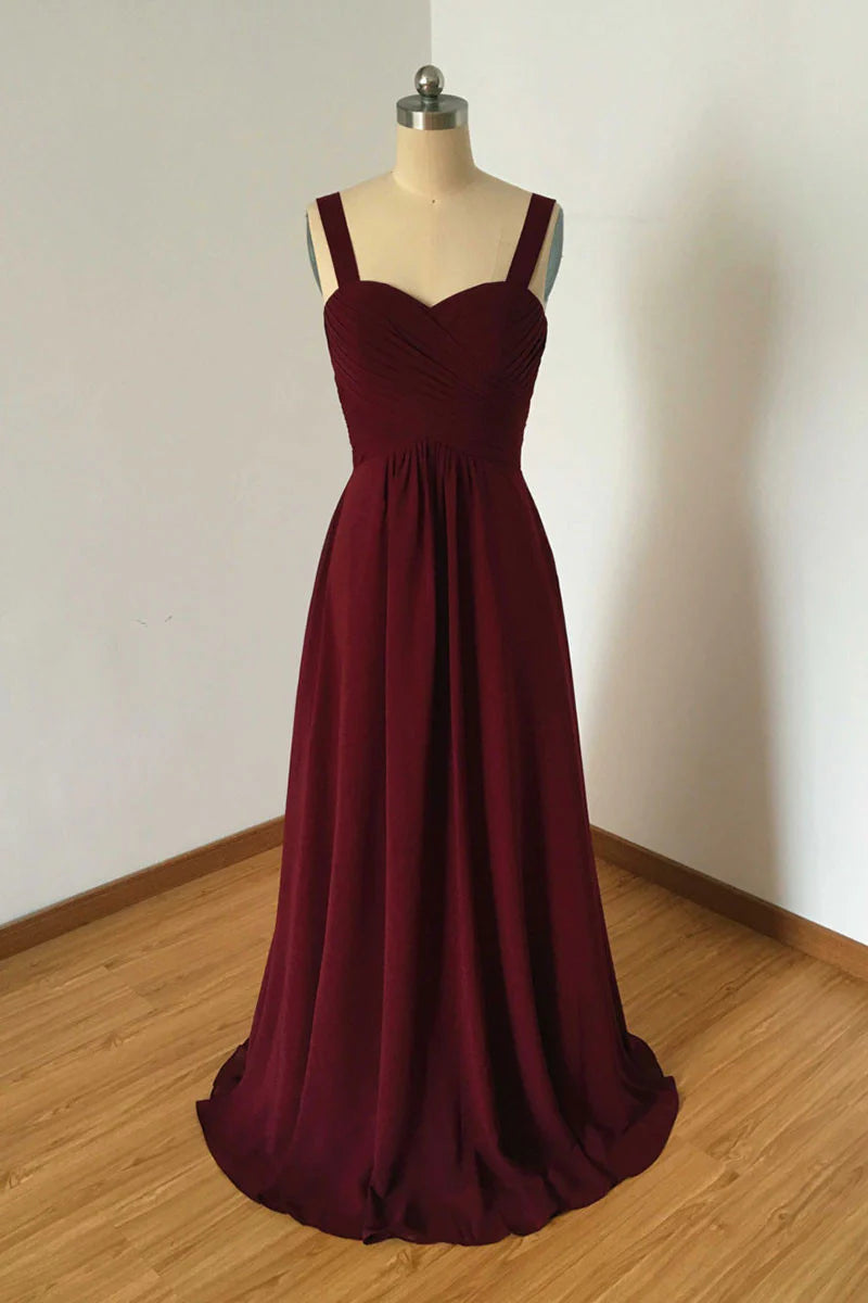 Model wearing an elegant burgundy A-line V-neck evening dress.