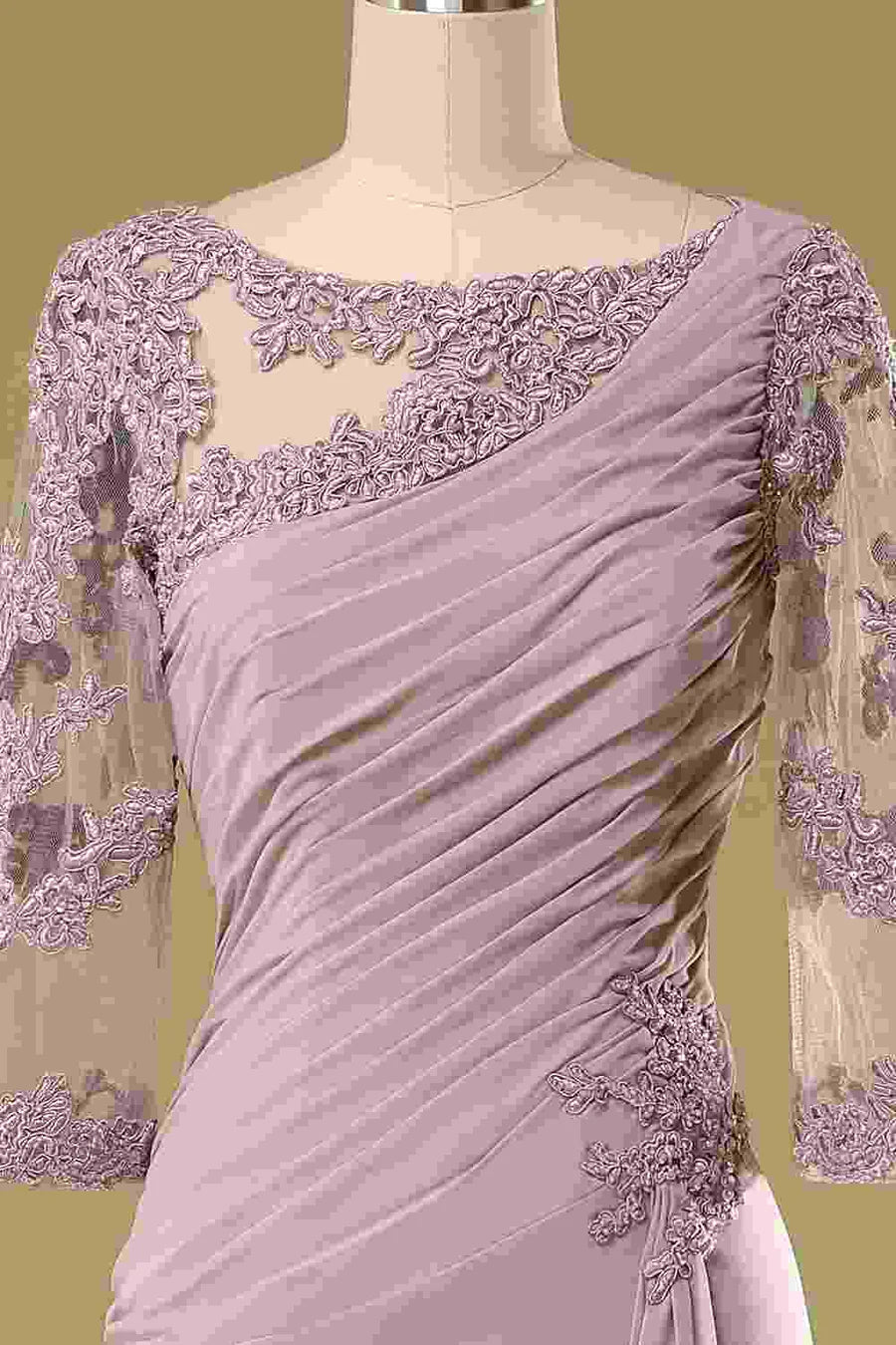 Model wearing a blush pink asymmetrical ruffled half sleeve mother of the bride dress, back view, showing elegant drape.