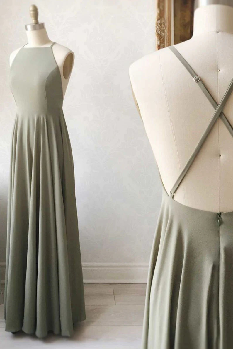 Woman wearing an elegant backless long chiffon prom dress in a light, flowing fabric.