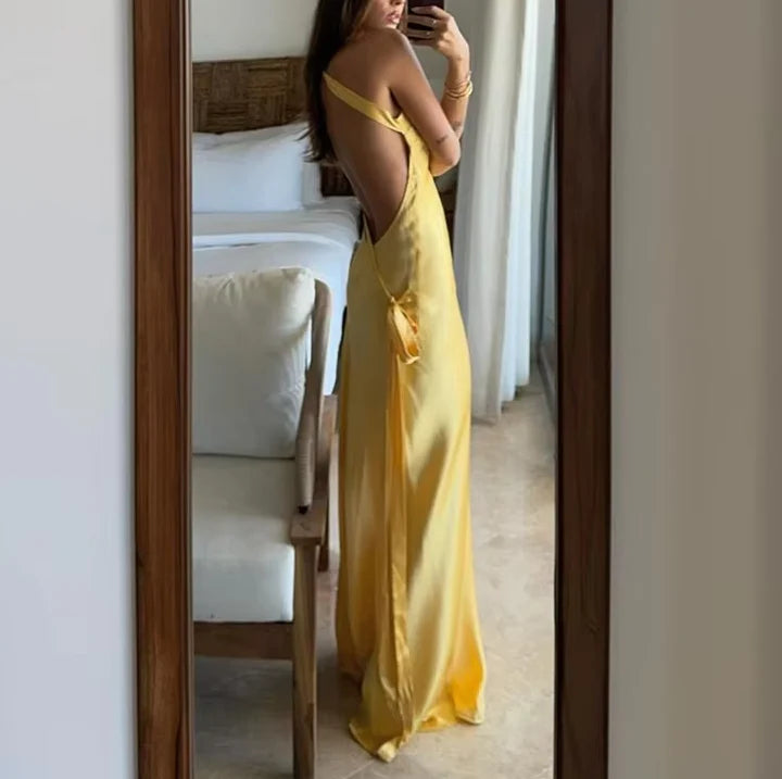 Back view of the elegant satin sleeveless maxi dress.