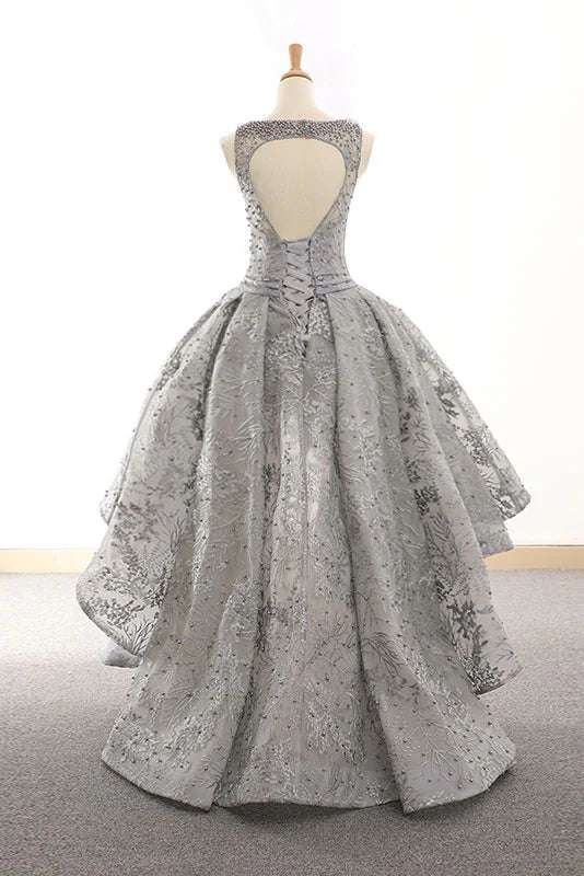 Back view of the gray tulle lace dress, highlighting its elegant backless style.