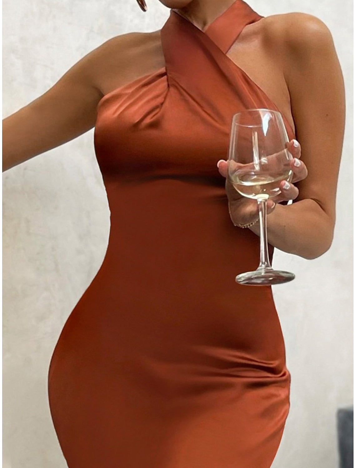 Woman in a black special occasion dress, showing the overall look.