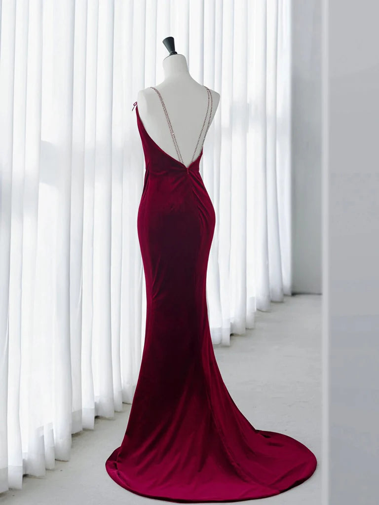 Burgundy long formal dress with mermaid silhouette.