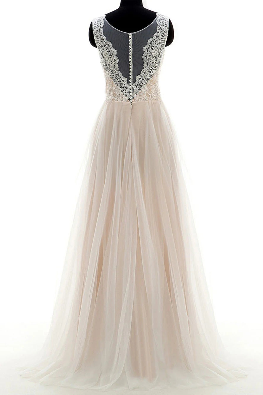 Model wearing an elegant champagne round neck tulle lace long dress for a formal event.