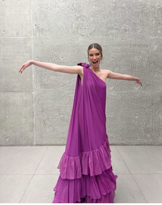 Back view of the elegant one-shoulder chiffon prom dress with delicate ruffles.