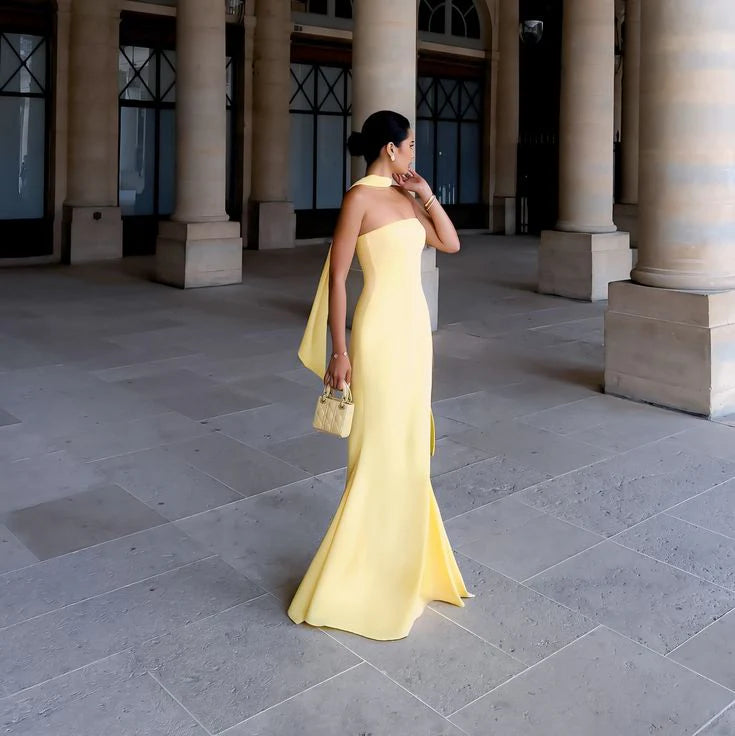 Close-up of the bodice and upper skirt of the off-shoulder strapless mermaid evening gown.