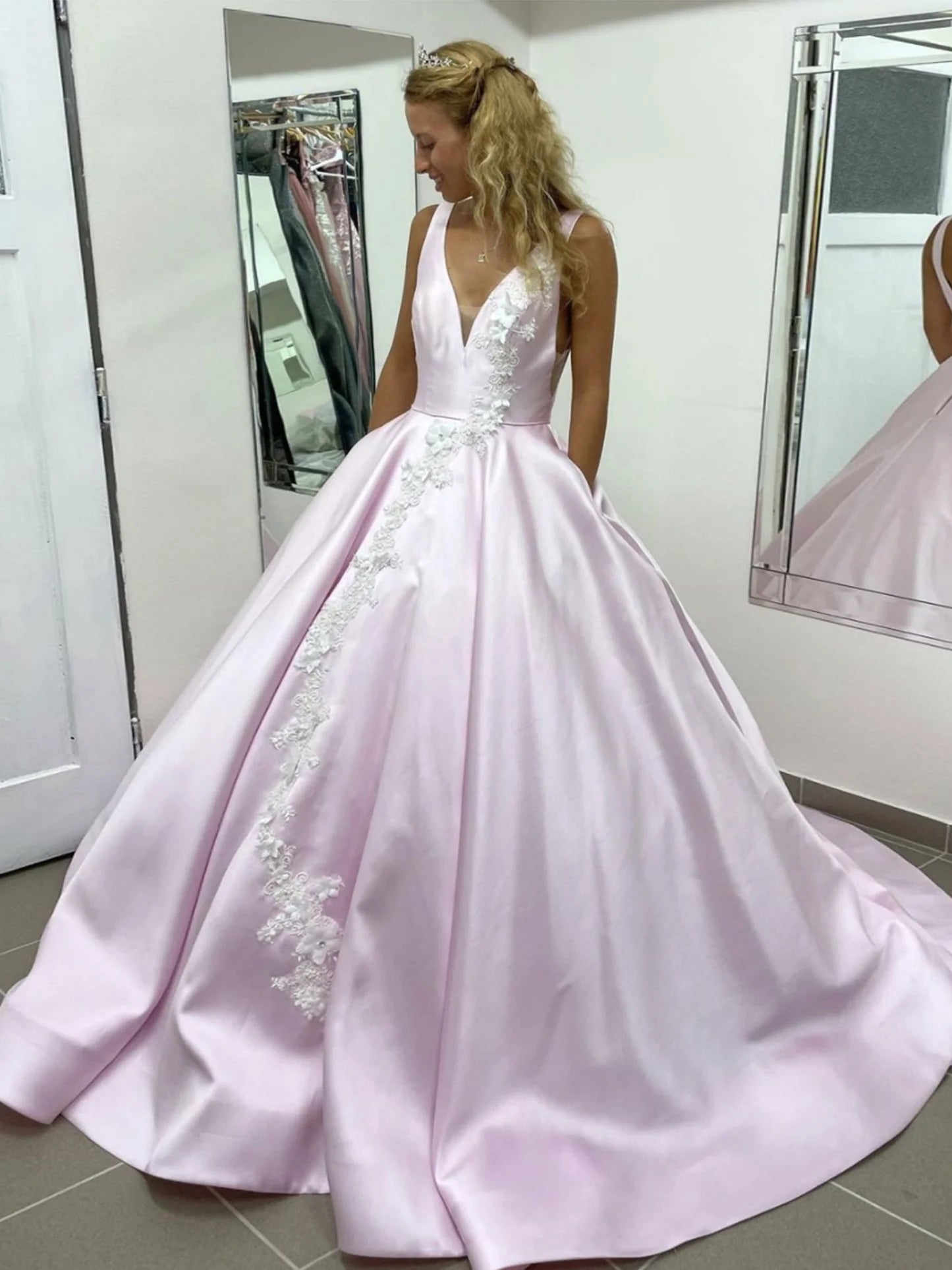Elegant pink V-neck satin lace long prom dress with applique detailing.
