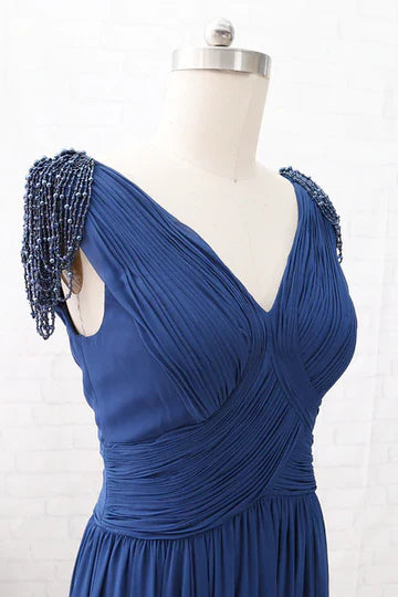 Back view of the long navy blue mother of the bride gown.