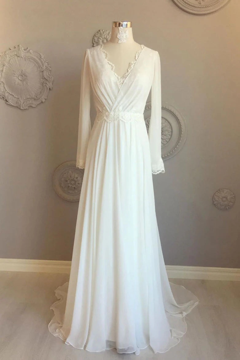Model wearing an elegant white chiffon V-neck long prom dress.