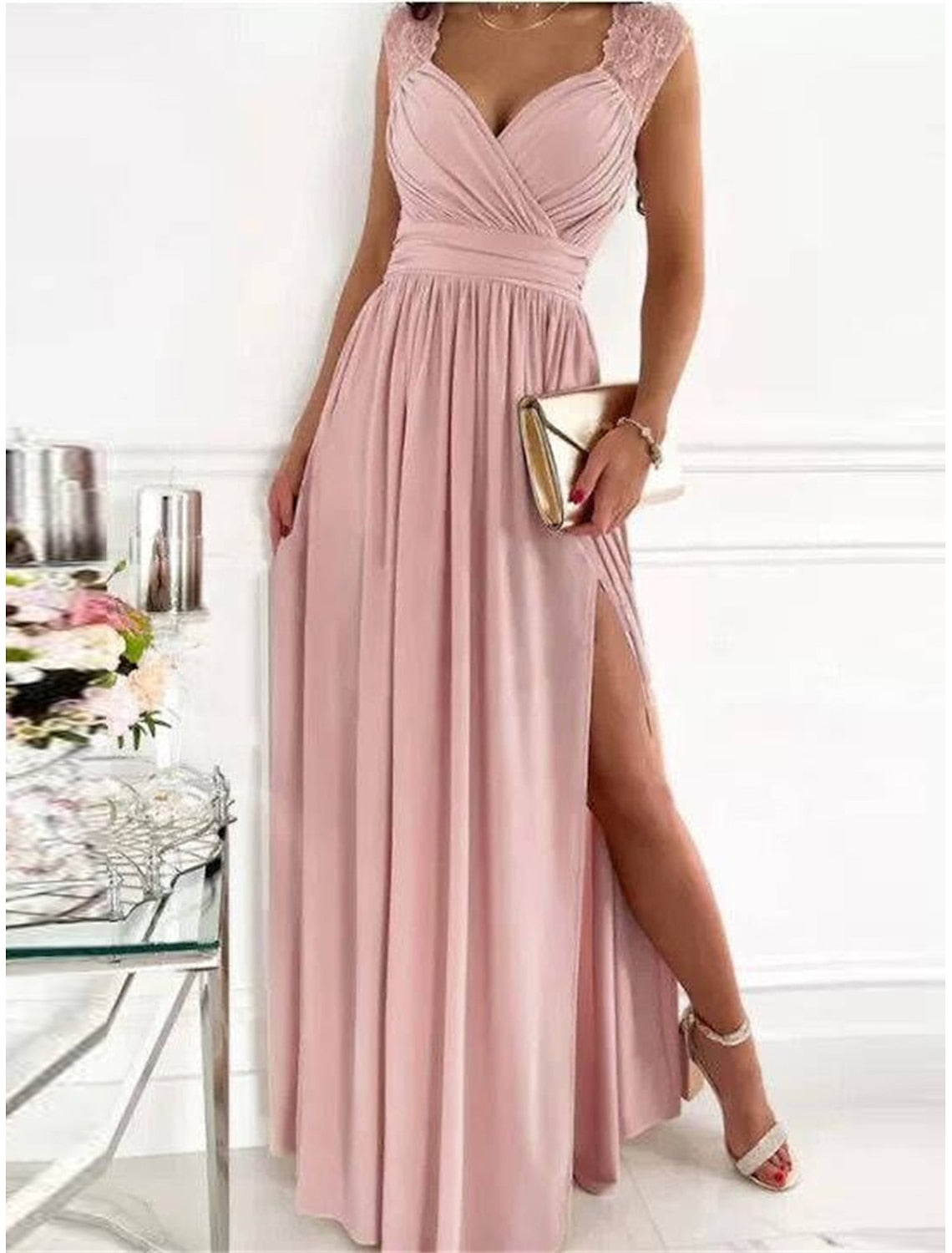 Full length view of the sleeveless lace prom dress.