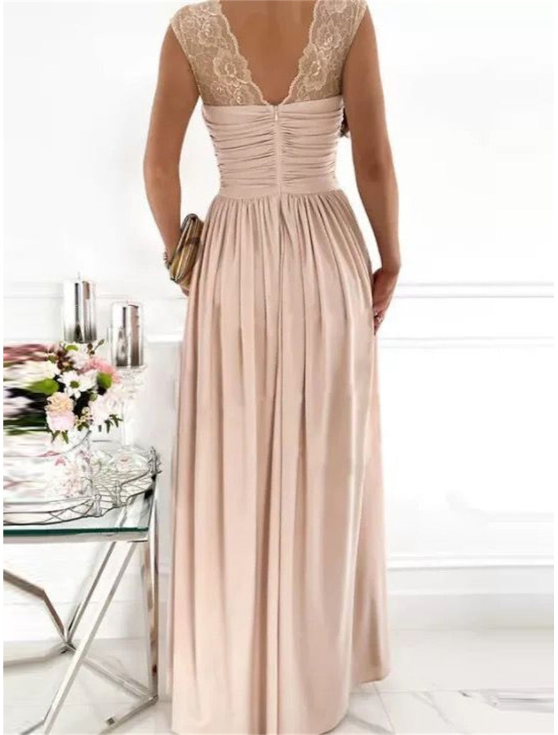 Detailed view of the fabric and fit of the lace prom dress.