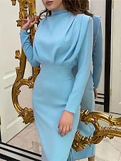 Woman wearing a plain loose-fit long-sleeve maxi dress with a stand collar.