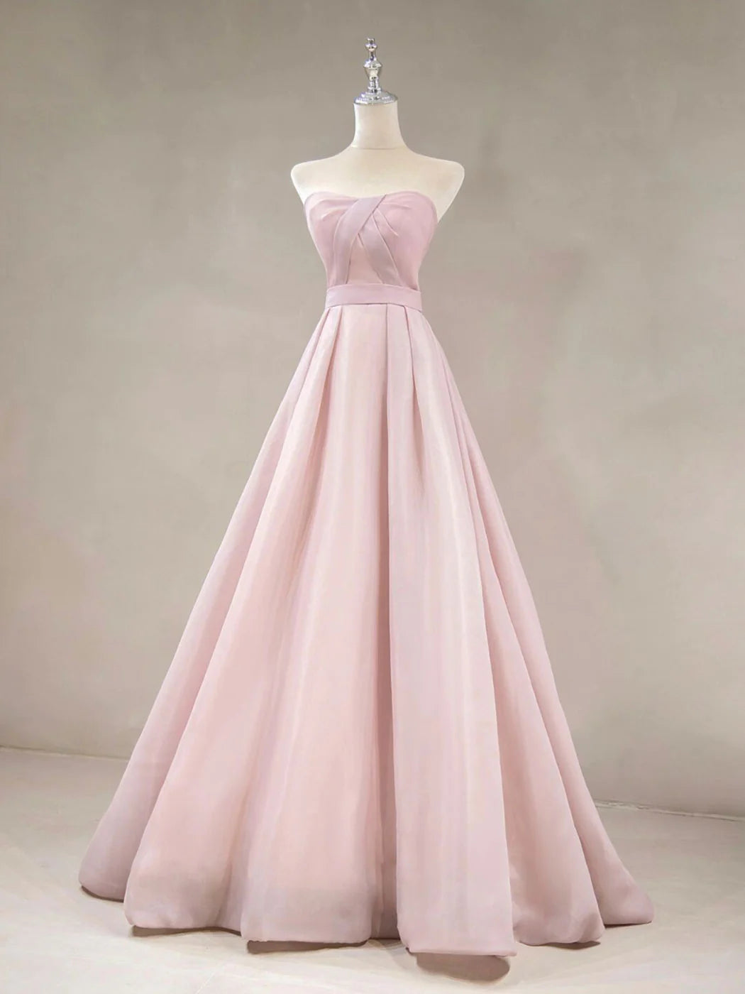 Elegant pink off-shoulder A-line long prom dress.