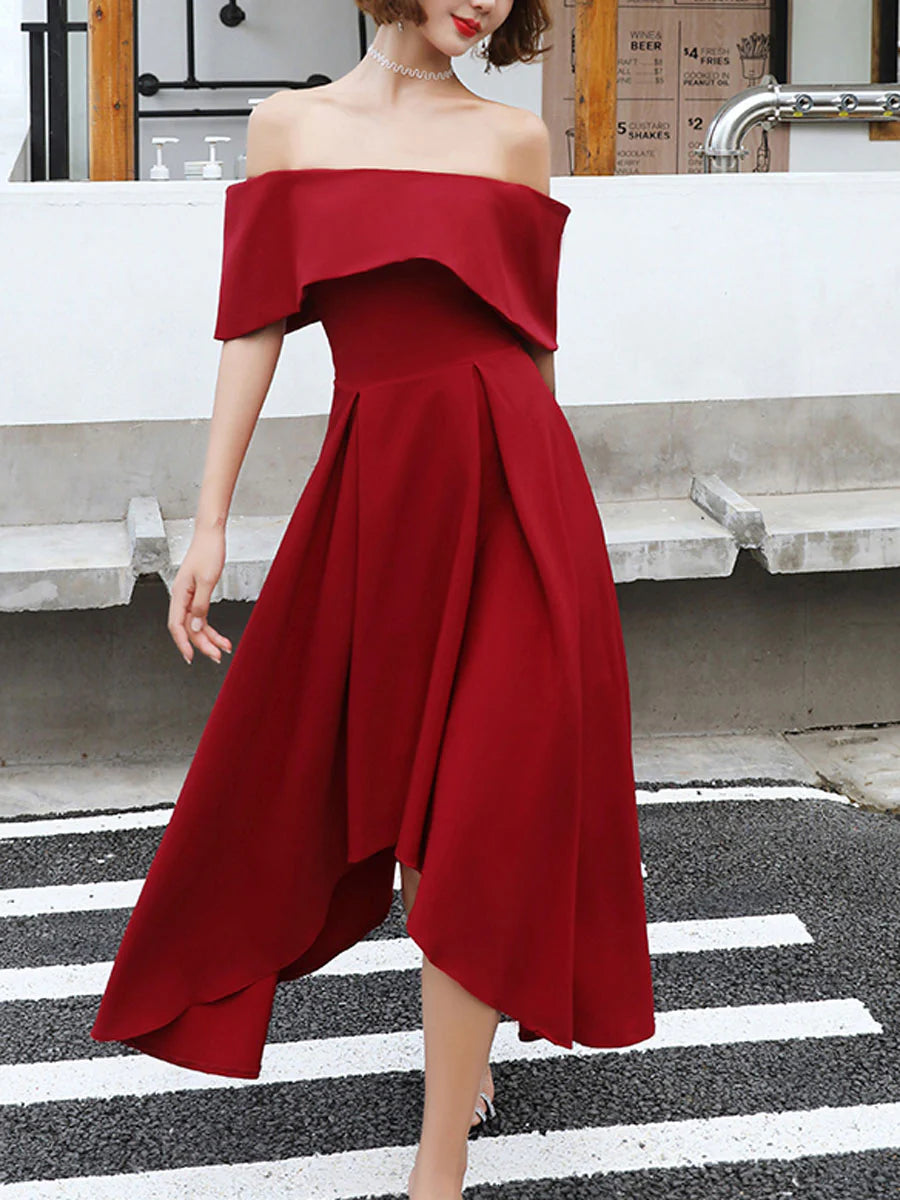 Model wearing an elegant off-shoulder burgundy prom dress with a fitted waist.