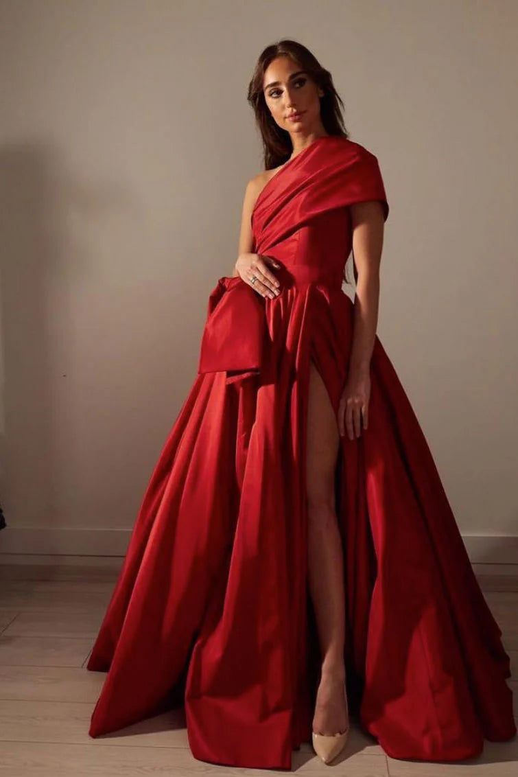Elegant red satin one-shoulder long prom dress with a flowing skirt.