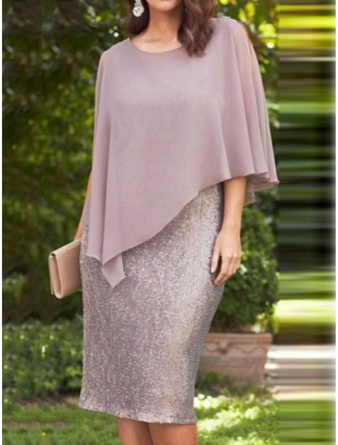 Woman wearing an elegant patchwork chiffon V-neck midi dress.