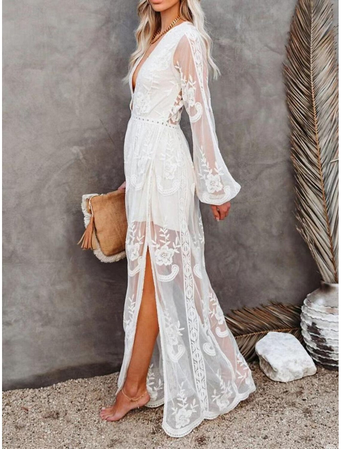 Full length view of the white patchwork V-neck maxi dress.