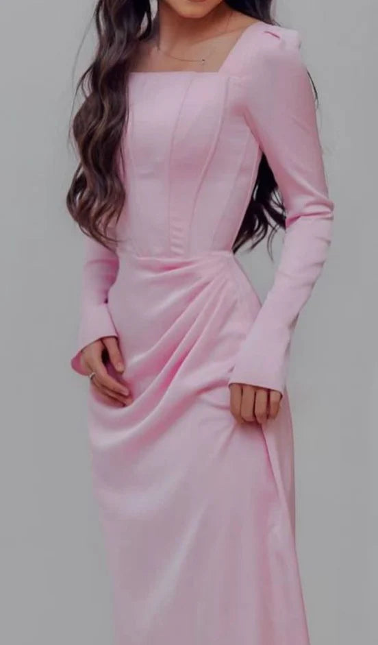 Back view of an elegant pink pleated square neck long sleeve floor length evening dress.