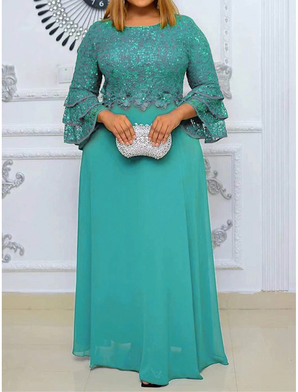 Side view of the plus size lace maxi dress, highlighting the intricate lace pattern.