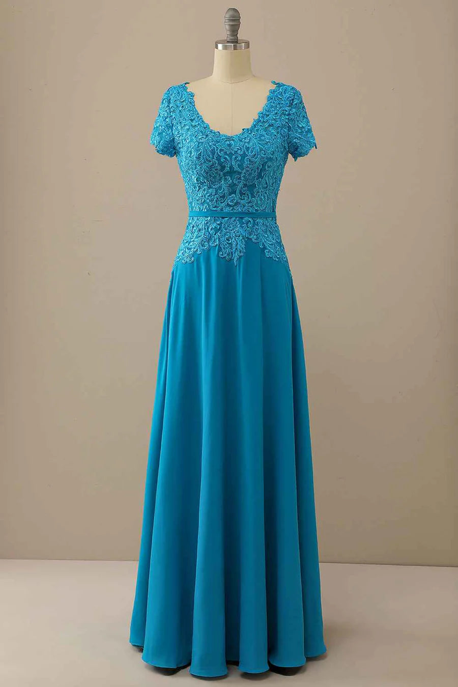 Elegant blue lace long dress with sweetheart neckline and short sleeves.
