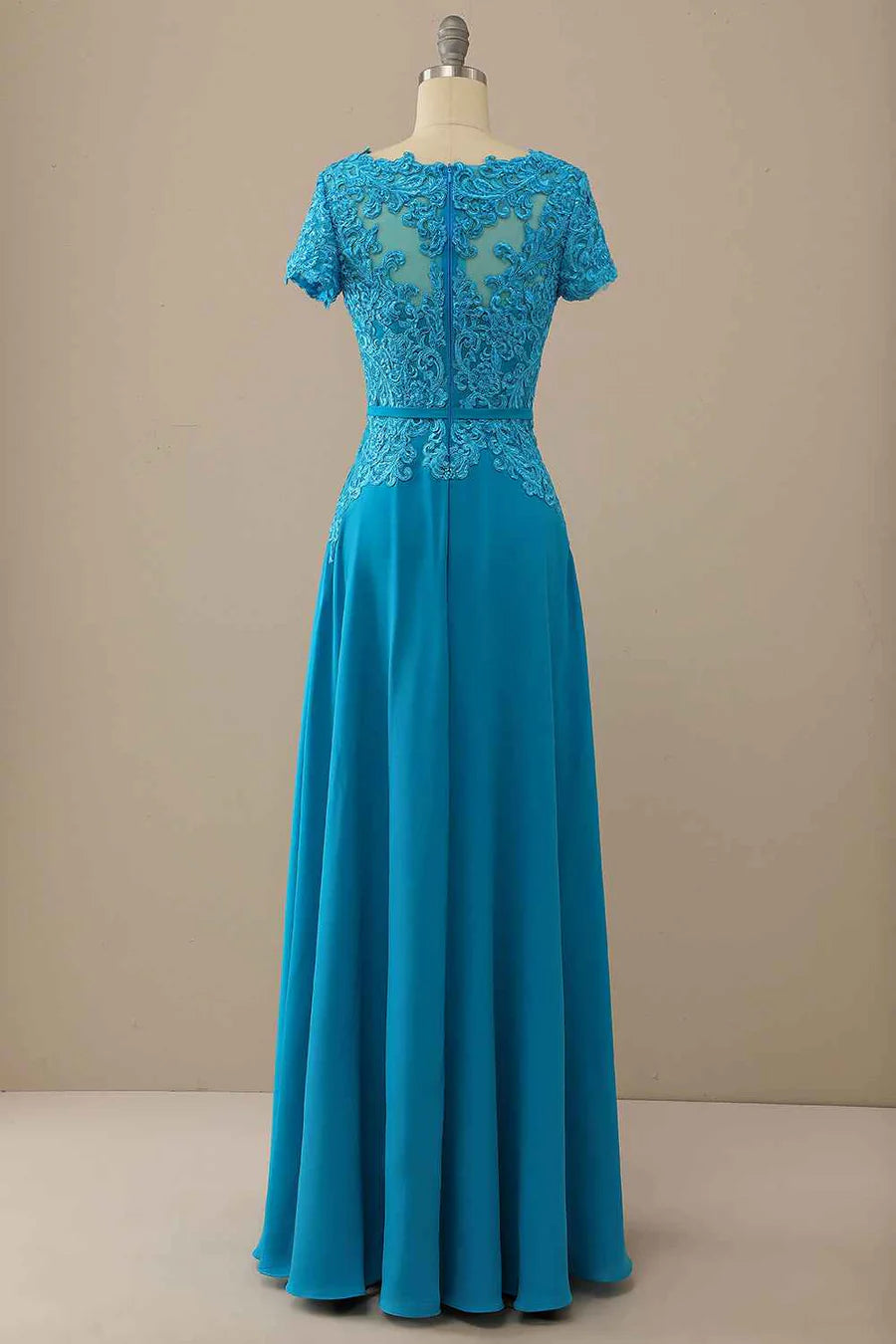 Back view of the elegant blue lace short sleeve dress.