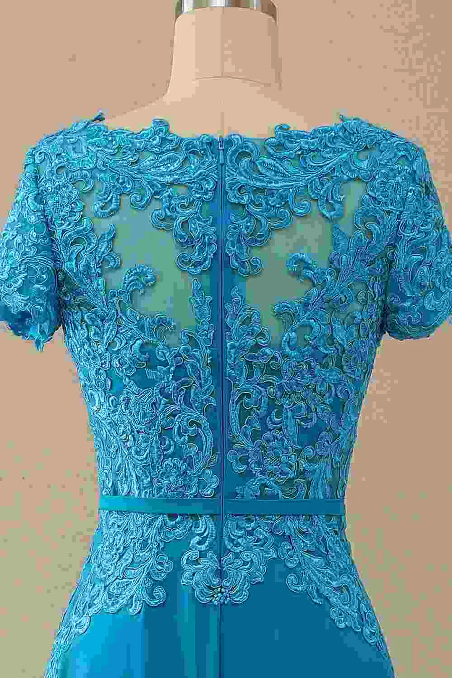 Full length view of the blue lace princess-seamed dress.