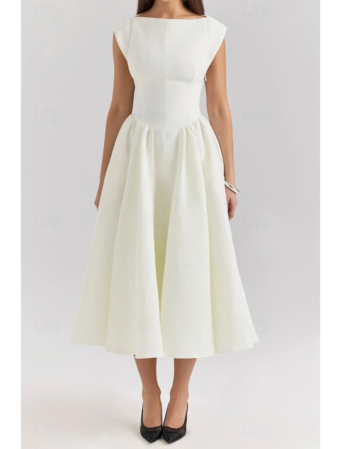 Woman wearing a white regular fit sleeveless midi dress with a crew neck.