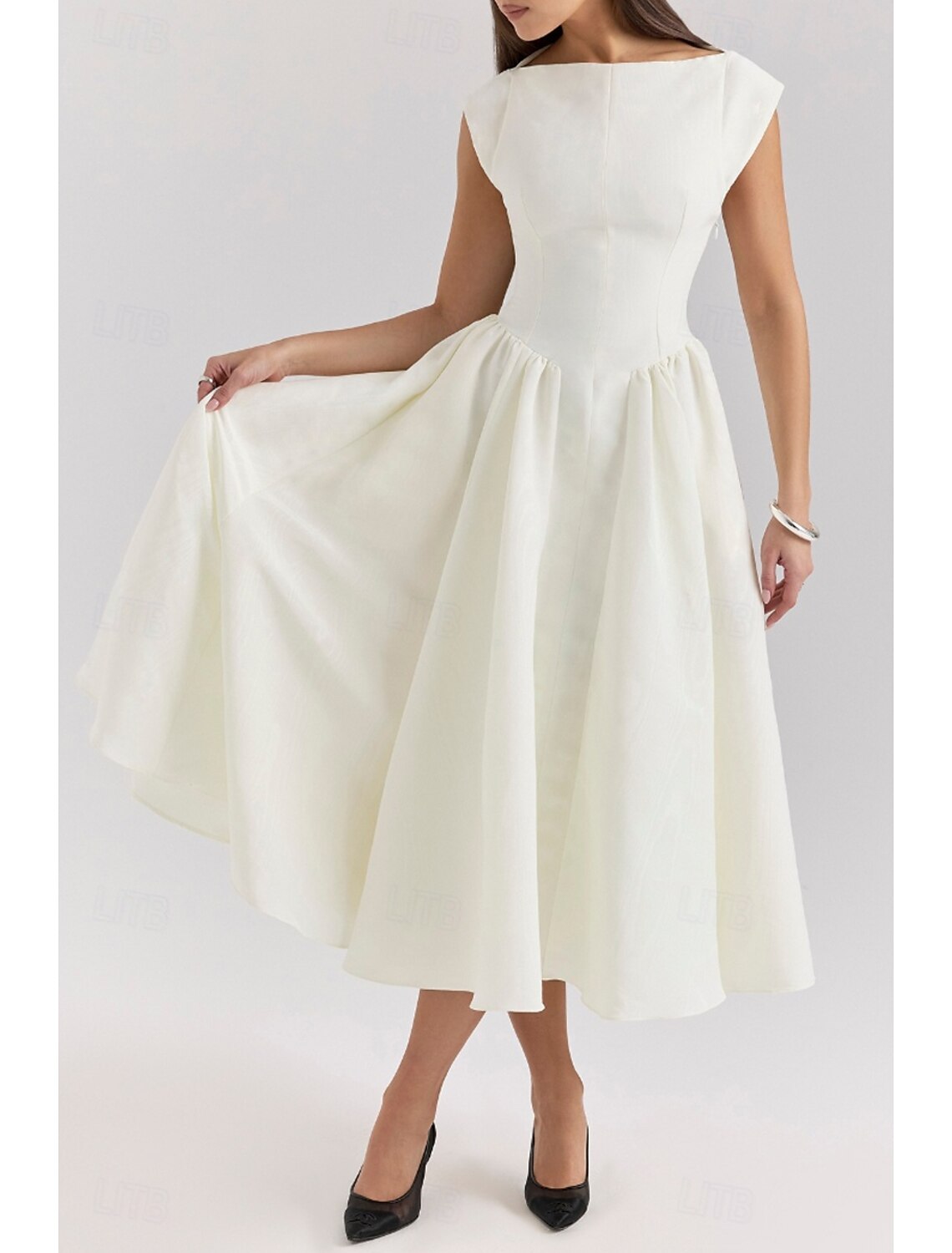 Woman wearing a light grey regular fit sleeveless midi dress with a crew neck.