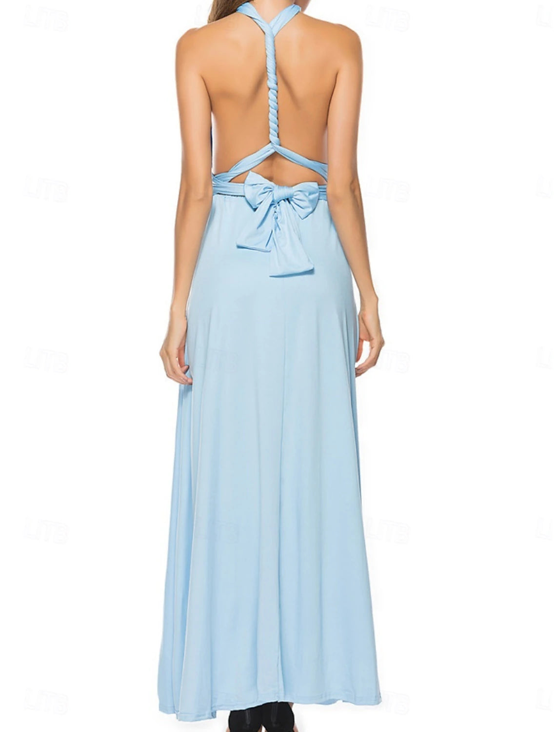 Back view of a woman showcasing the halter neck detail of a blue maxi dress.