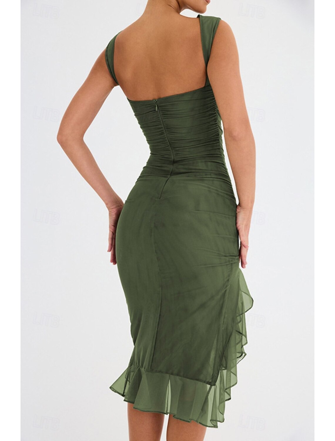 Side view of the model showcasing the flattering sheath silhouette of the dress.