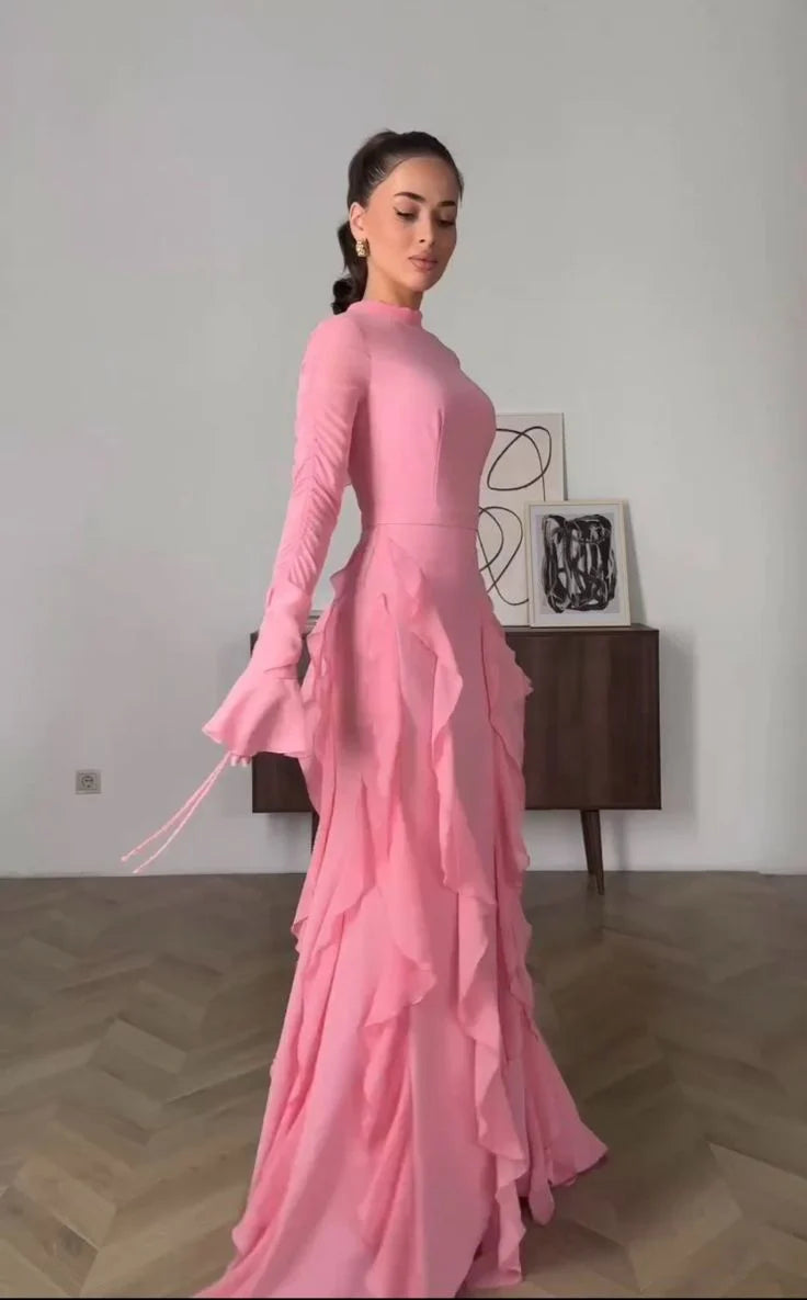 Pink ruffle chiffon long sleeve dress on a model, front view.
