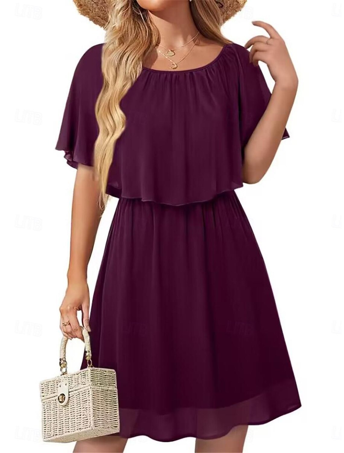 Woman wearing an elegant beige ruffle chiffon mini dress with short sleeves and a crew neck.