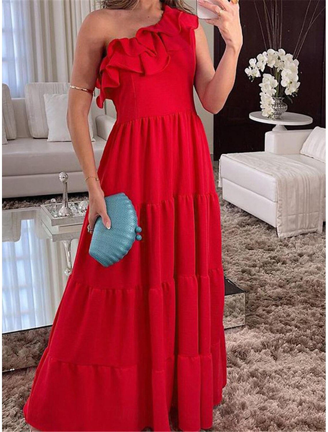 Elegant black one-shoulder ruffle maxi dress.
