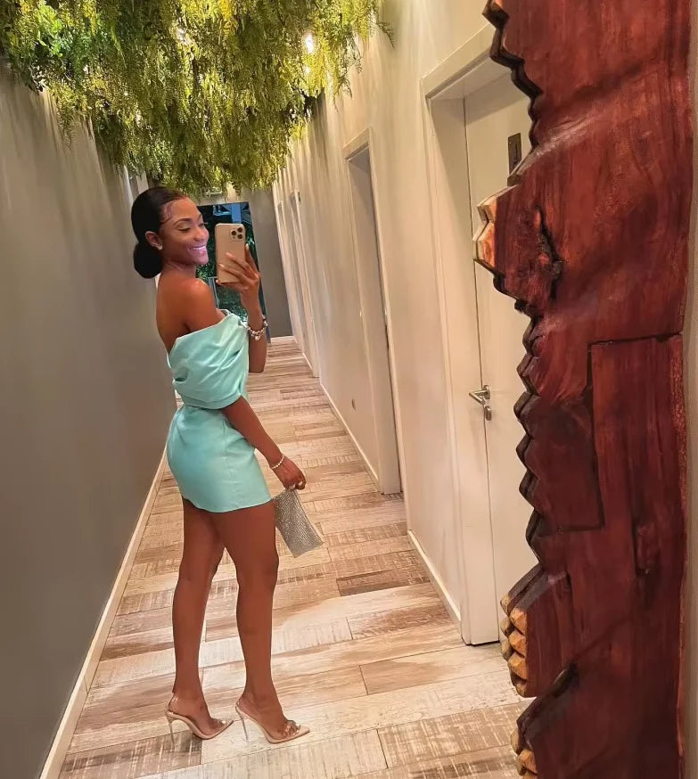 Back view of the Tiffany Blue spaghetti strap satin dress.