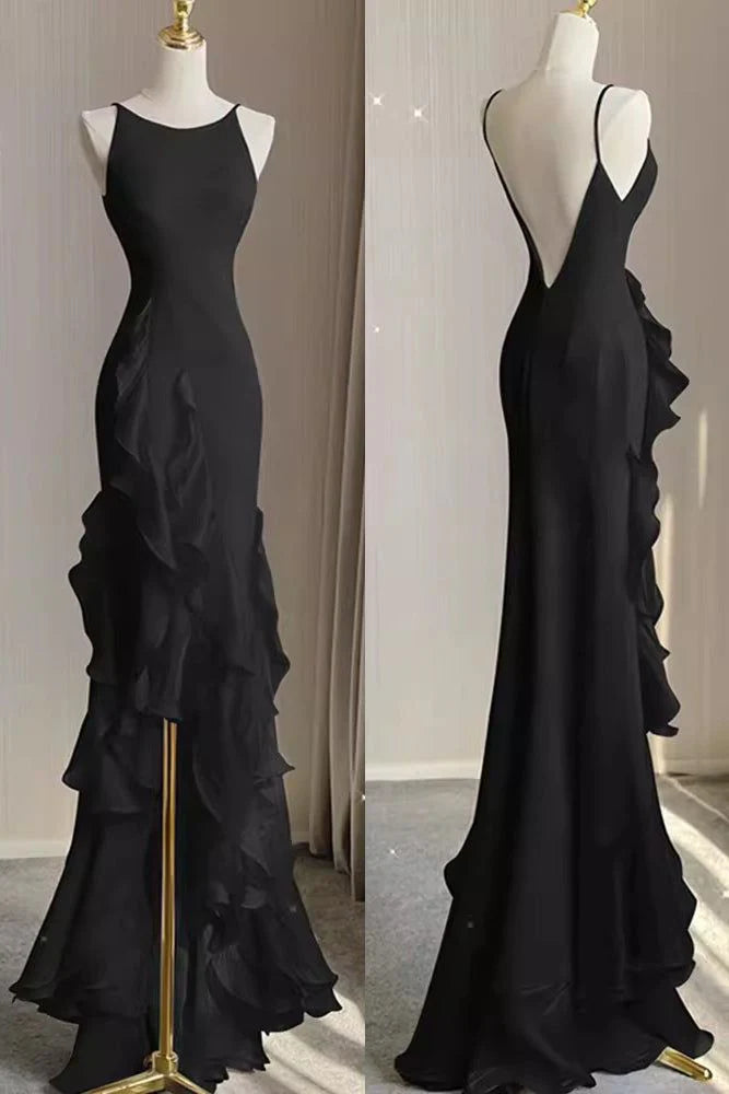 Back view of the white halter backless wedding dress, highlighting the open back.