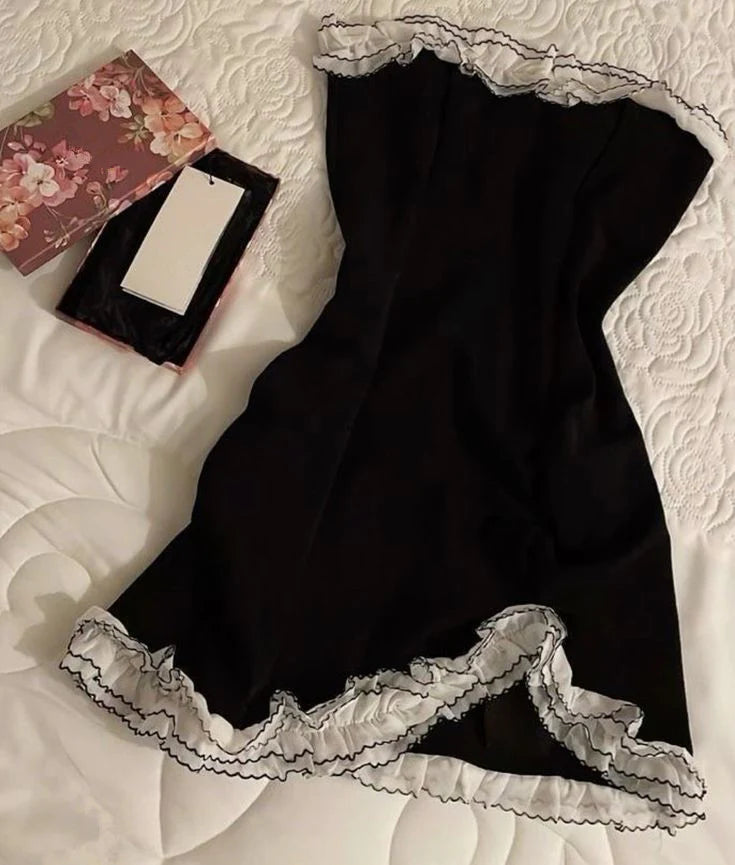 Elegant black lace mini homecoming dress with satin fabric and slim fit.