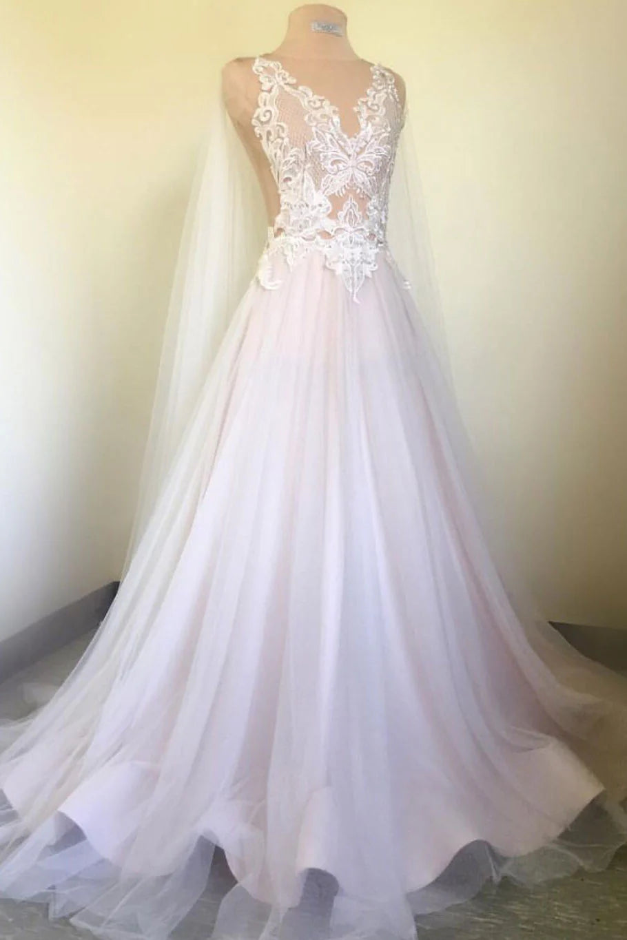 Elegant white V-neck lace applique long slim-fit dress.