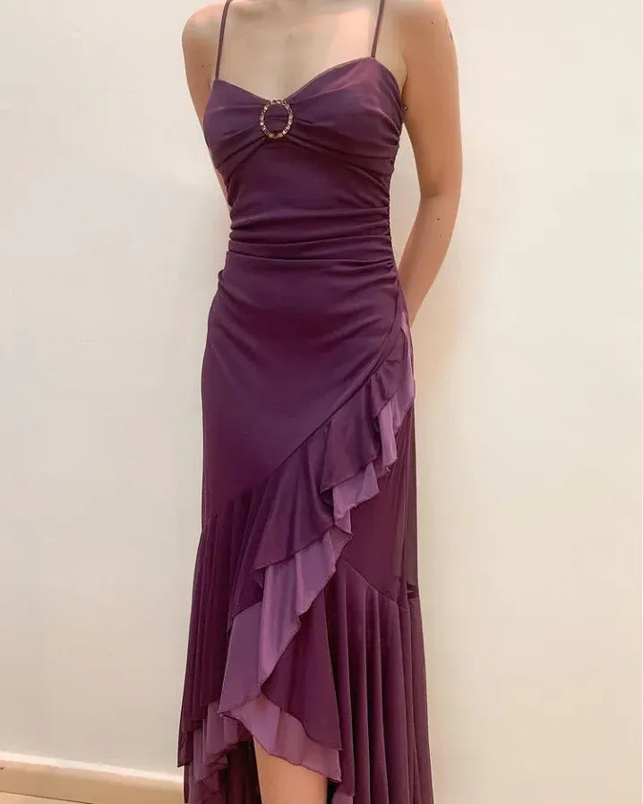 Back view of the elegant purple ruffled evening gown.