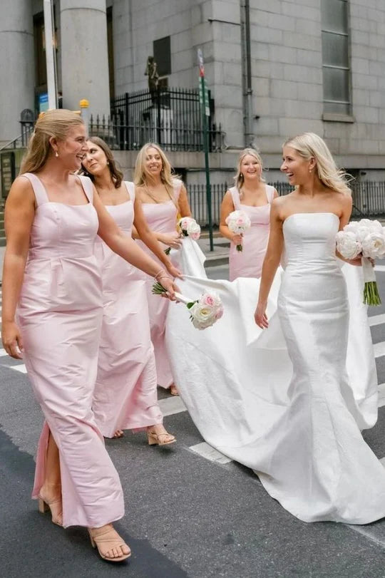 Full view of the pink satin long bridesmaid dress, highlighting its elegant silhouette.