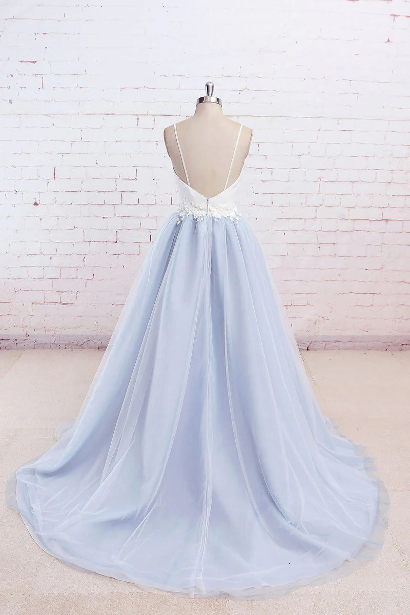 Elegant strapless blue A-line tulle long prom dress, showcasing the flowing skirt and fabric.